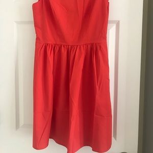 Coral boutique dress with adorable back!